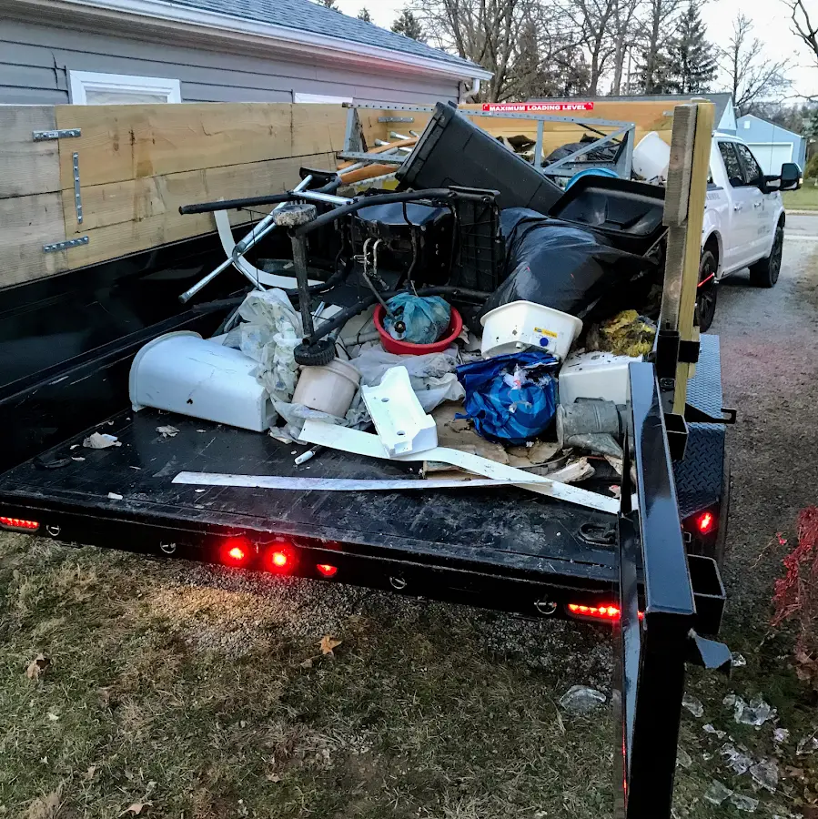Roll-off dumpster delivered to a residential driveway in Liberty