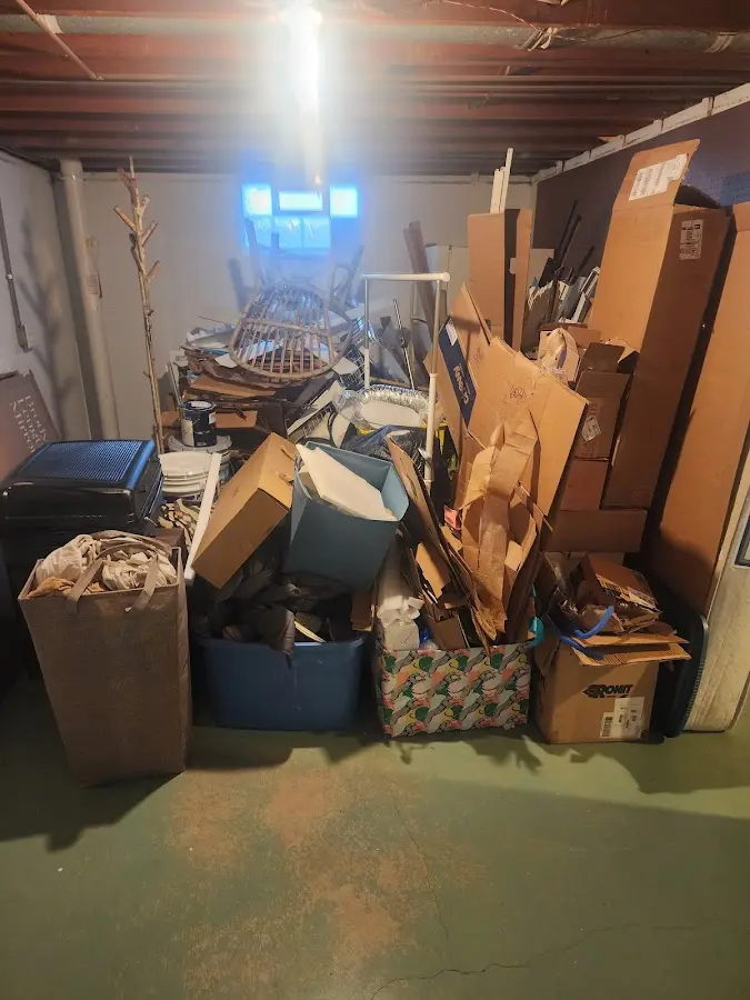 Roll-off dumpster container at job site for Yard Waste Dumpster Rental in Liberty